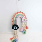 Macrame rainbow: handmade home decoration wall hanging