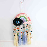 Macrame rainbow: handmade home decoration wall hanging
