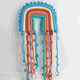 Macrame rainbow: handmade home decoration wall hanging